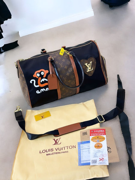 LOU.IS VUI.TTON VENTURER DUFFLE