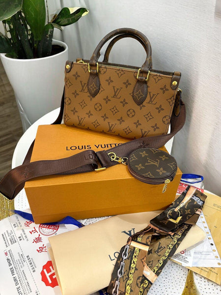 LOUI.S VUITTO.N ON THE GO EAST WEST BAG