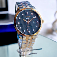 Ome°ga Date-Day Metal Watch