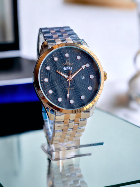 Ome°ga Date-Day Metal Watch