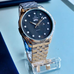 Ome°ga Date-Day Metal Watch
