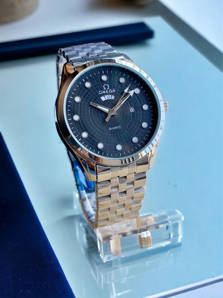 Ome°ga Date-Day Metal Watch
