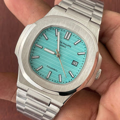 Pat.ek Phi.lipp 	Nautilus
Quartz movement