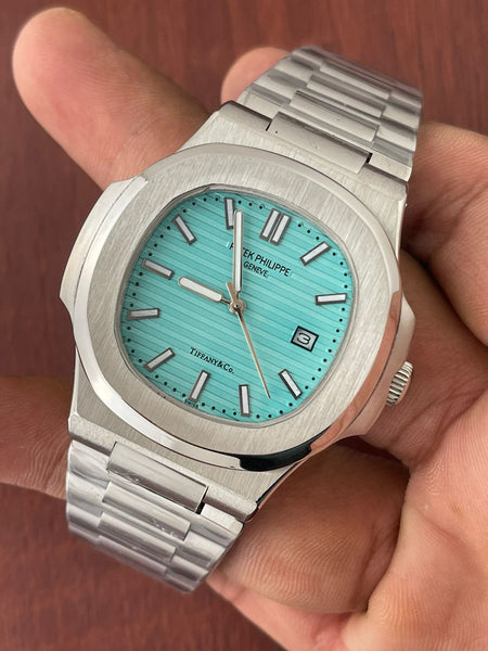 Pat.ek Phi.lipp 	Nautilus
Quartz movement