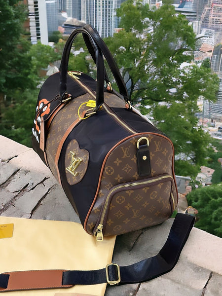 LOU.IS VUI.TTON VENTURER DUFFLE
