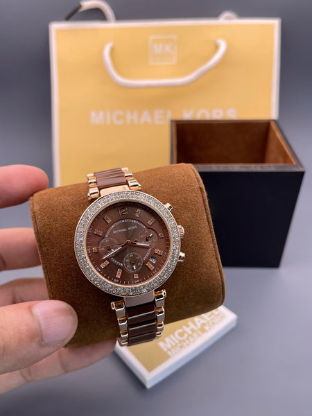Mich.ael Ko.rs Ladied Parker MK6378
Quartz movement