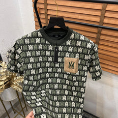AMI.RI  MONOGRAM PRINTED LEATHER POCKET IMPORTED DROP SHOULDER T-SHIRT