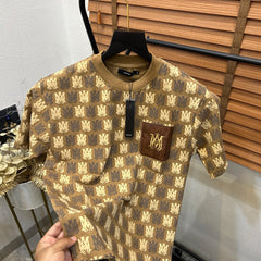 AMI.RI  MONOGRAM PRINTED LEATHER POCKET IMPORTED DROP SHOULDER T-SHIRT