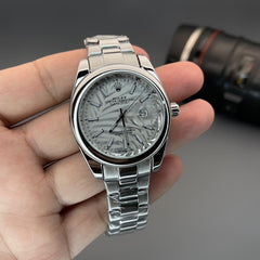 Rol.ex oyster date with white dial