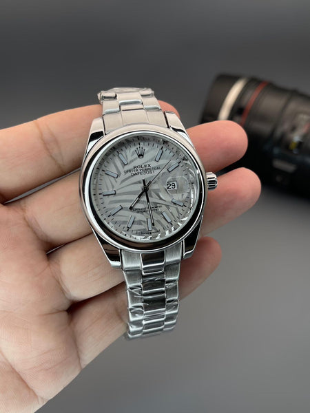 Rol.ex oyster date with white dial