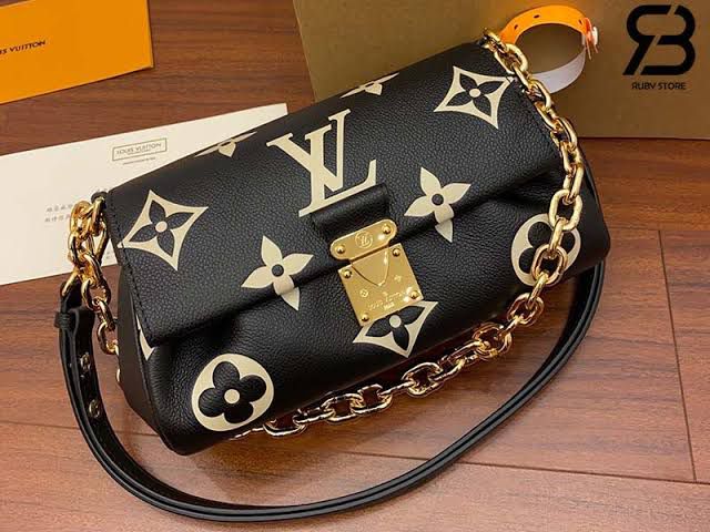 LO.UIS VUIT.TON EMPREINTE LEATHER HANDBAG CUM SLING