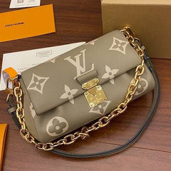 LO.UIS VUIT.TON EMPREINTE LEATHER HANDBAG CUM SLING