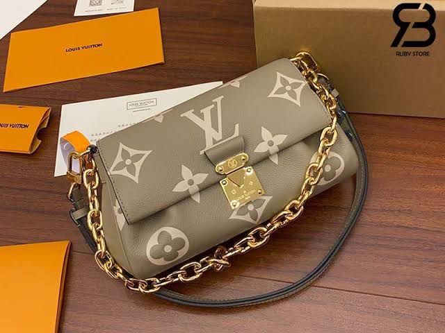 LO.UIS VUIT.TON EMPREINTE LEATHER HANDBAG CUM SLING