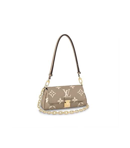 LO.UIS VUIT.TON EMPREINTE LEATHER HANDBAG CUM SLING