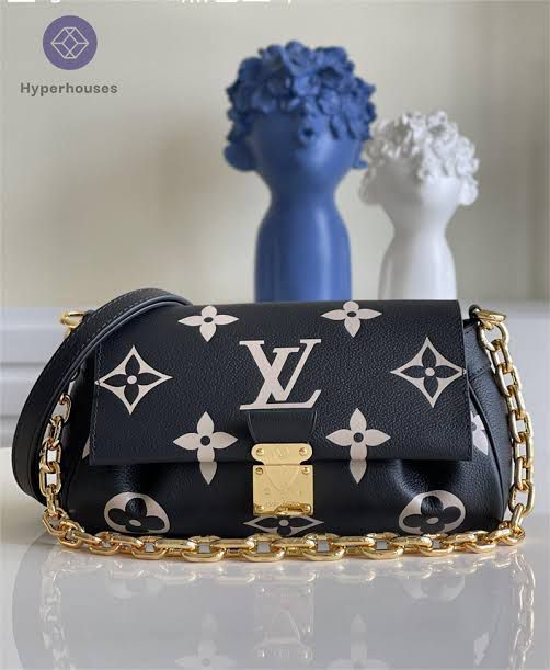 LO.UIS VUIT.TON EMPREINTE LEATHER HANDBAG CUM SLING