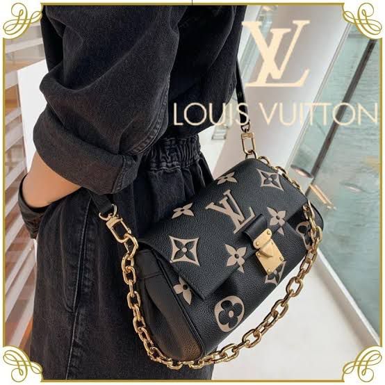 LO.UIS VUIT.TON EMPREINTE LEATHER HANDBAG CUM SLING