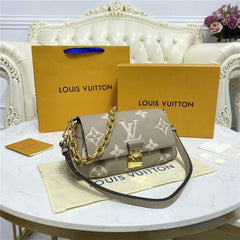 LO.UIS VUIT.TON EMPREINTE LEATHER HANDBAG CUM SLING