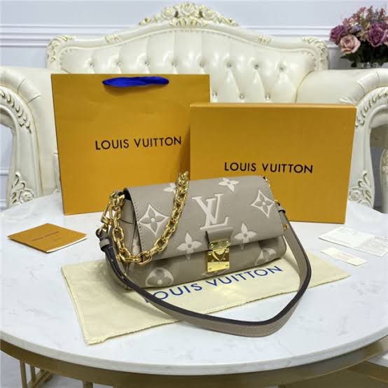 LO.UIS VUIT.TON EMPREINTE LEATHER HANDBAG CUM SLING