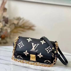 LO.UIS VUIT.TON EMPREINTE LEATHER HANDBAG CUM SLING