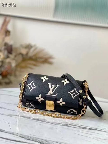 LO.UIS VUIT.TON EMPREINTE LEATHER HANDBAG CUM SLING