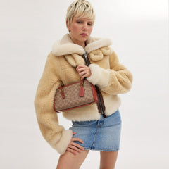 Coa.ch swing zip bag