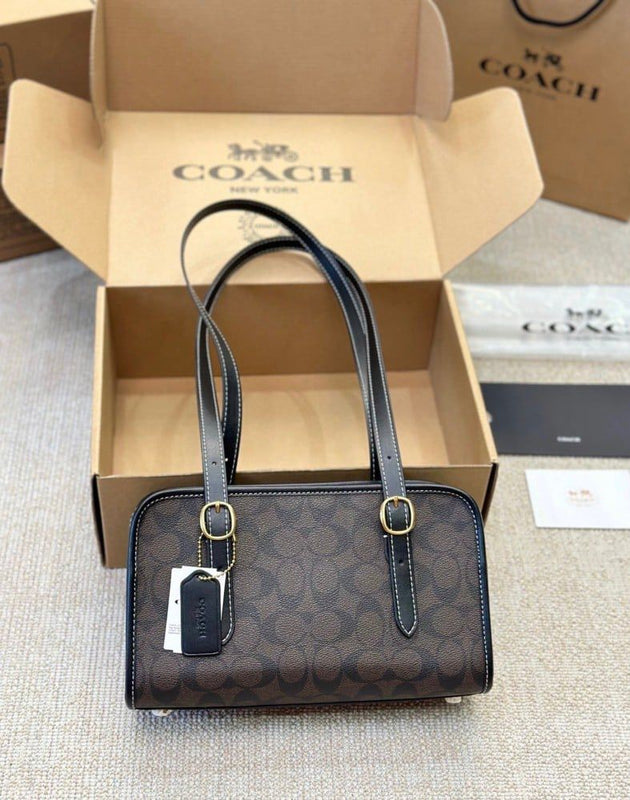 Coa.ch swing zip bag