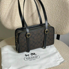 Coa.ch swing zip bag
