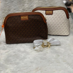 MICH.AEL KO.RS LARGE  DOME CROSS BODY SLING