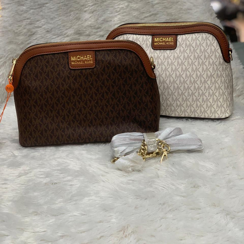 MICH.AEL KO.RS LARGE  DOME CROSS BODY SLING