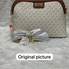 MICH.AEL KO.RS LARGE  DOME CROSS BODY SLING