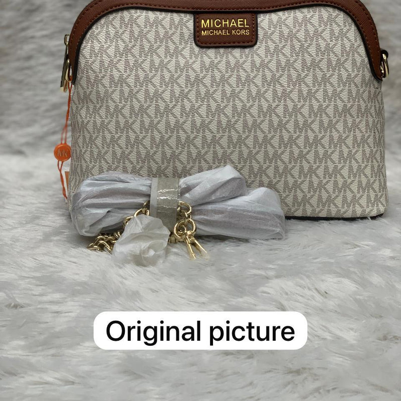 MICH.AEL KO.RS LARGE  DOME CROSS BODY SLING