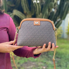 MICH.AEL KO.RS LARGE  DOME CROSS BODY SLING