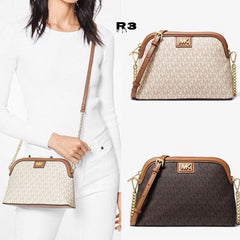 MICH.AEL KO.RS LARGE  DOME CROSS BODY SLING