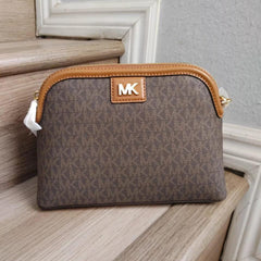 MICH.AEL KO.RS LARGE  DOME CROSS BODY SLING