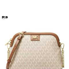 MICH.AEL KO.RS LARGE  DOME CROSS BODY SLING