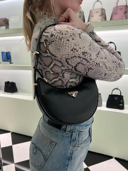 Pra.da half moon bag