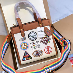 COA.CH FEILD TOTE 22 BAG IN COLORBLOCK WITH PATCHE