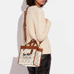 Coa.ch fi.eld horse and carriage tote bag