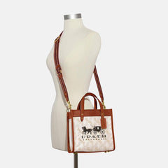 Coa.ch fi.eld horse and carriage tote bag