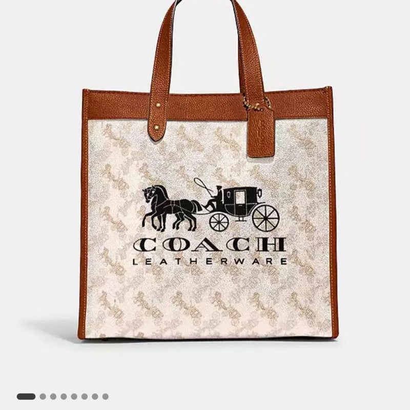 Coa.ch fi.eld horse and carriage tote bag