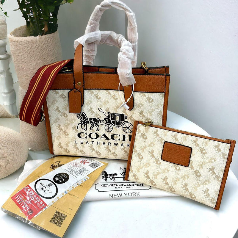 Coa.ch fi.eld horse and carriage tote bag