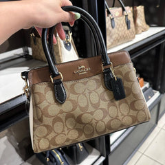 COA.CH DAR.CIE SIGNATURE CANVAS LEATHER HANDBAG CUM SLING