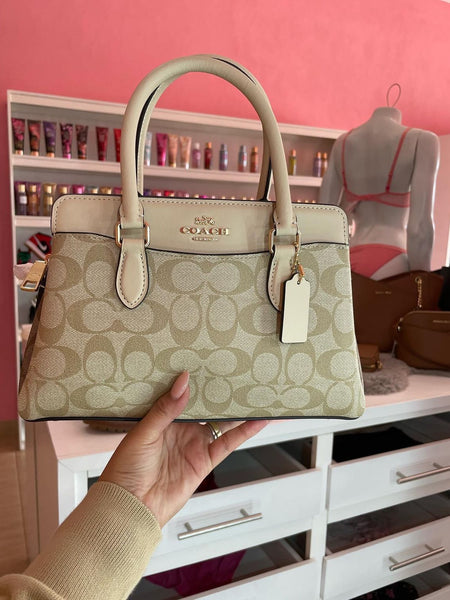 COA.CH DAR.CIE SIGNATURE CANVAS LEATHER HANDBAG CUM SLING