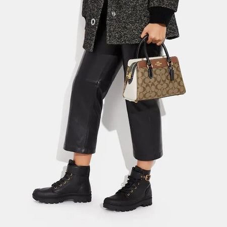 COA.CH DAR.CIE SIGNATURE CANVAS LEATHER HANDBAG CUM SLING