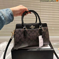 COA.CH DAR.CIE SIGNATURE CANVAS LEATHER HANDBAG CUM SLING