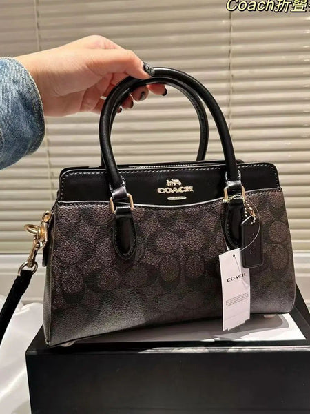 COA.CH DAR.CIE SIGNATURE CANVAS LEATHER HANDBAG CUM SLING
