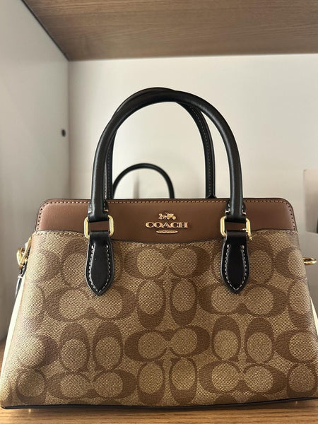 COA.CH DAR.CIE SIGNATURE CANVAS LEATHER HANDBAG CUM SLING