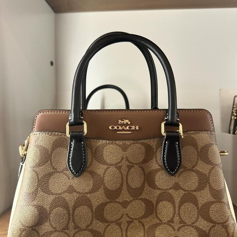 COA.CH DAR.CIE SIGNATURE CANVAS LEATHER HANDBAG CUM SLING