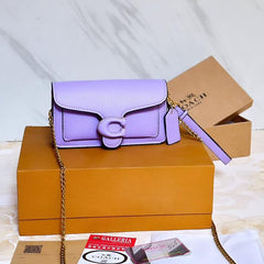 CO.ACH TABBY WRISTLET CUM SHOULDER BAG