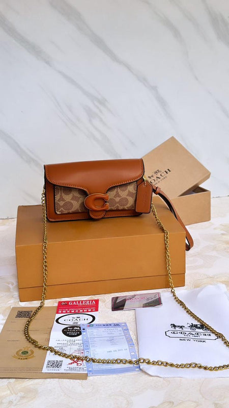 CO.ACH TABBY WRISTLET CUM SHOULDER BAG